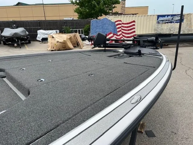 Slide: The Image of 2022 Nitro Z19 boat deck with Garmin equipment in a parking lot. - 3