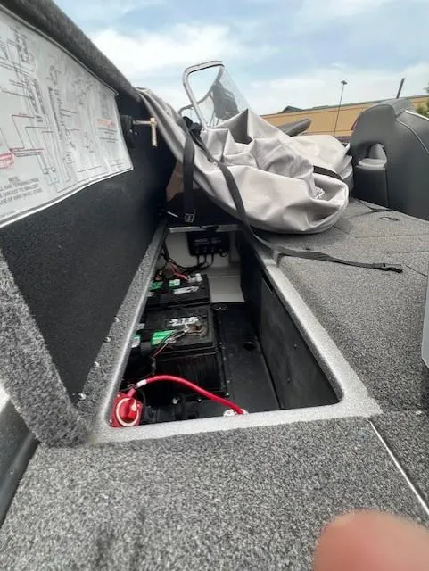 Slide: The Image of 2022 Nitro Z19 boat interior showing battery compartment and wiring details. - 7