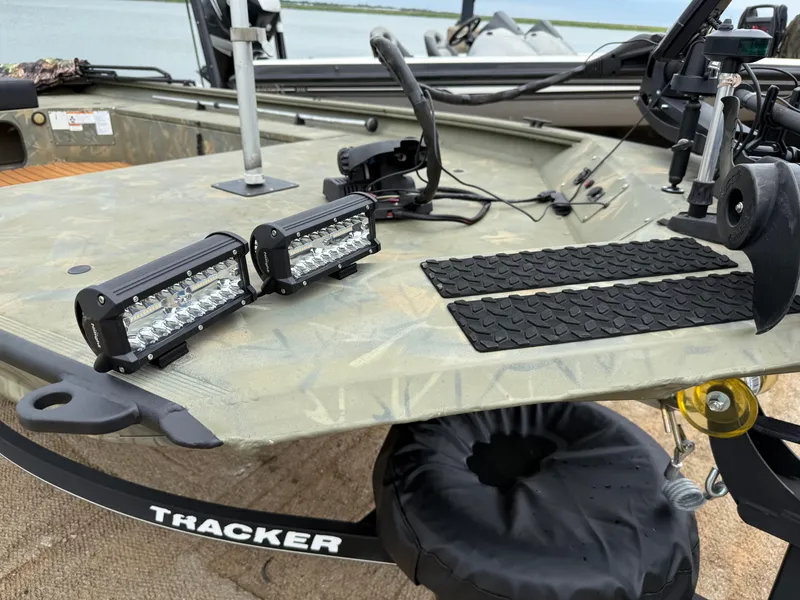 Slide: The Image of 2017 Tracker Grizzly 1654 MVX Sportsman boat with LED lights and fishing gear. - 21