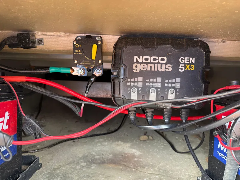 Slide: The Image of Noco Genius GEN 5X3 charger setup in 2017 Tracker Grizzly 1654 MVX Sportsman boat. - 42