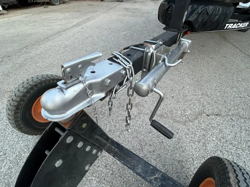 Slide: The Image of Trailer hitch of 2017 Tracker Grizzly 1654 MVX Sportsman on pavement. - 48