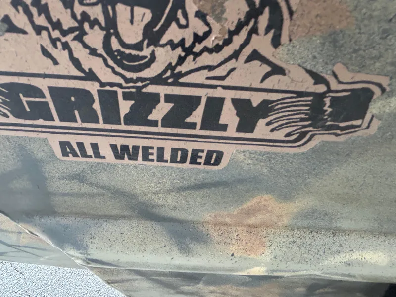 Slide: The Image of 2017 Tracker Grizzly 1654 MVX Sportsman, all-welded camouflage design. - 51