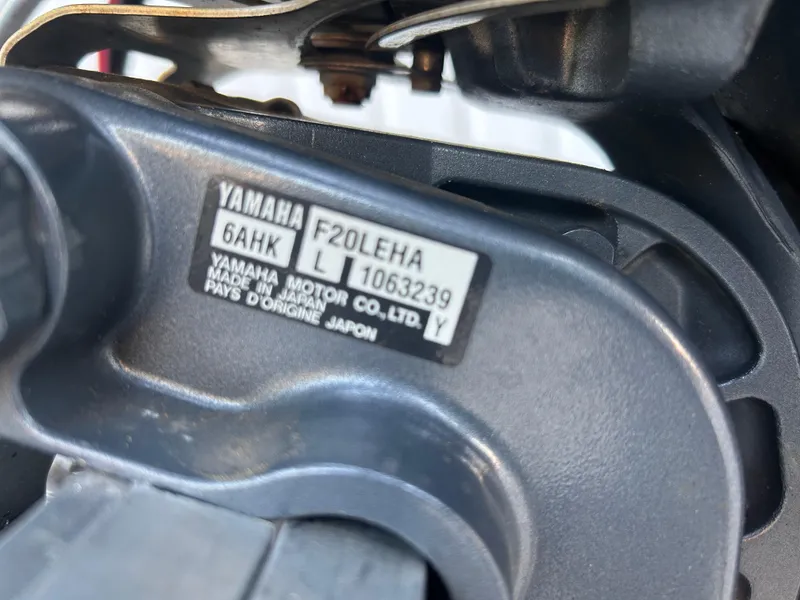 Slide: The Image of Close-up of Yamaha motor label on 2017 Tracker Grizzly 1654 MVX Sportsman. - 53