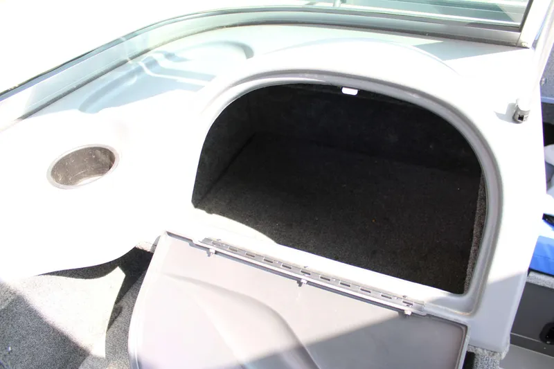 Slide: The Image of Open storage compartment in 2013 Lund 1675 Impact Sport boat. - 14