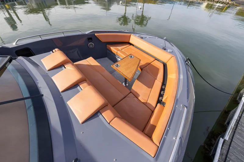 Slide: The Image of 2022 Cruisers Yachts 38 GLS South Beach IO with luxurious seating and table on deck. - 29