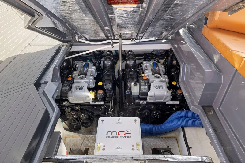 Slide: The Image of Engine compartment of 2022 Cruisers Yachts 38 GLS South Beach IO with dual engines. - 41