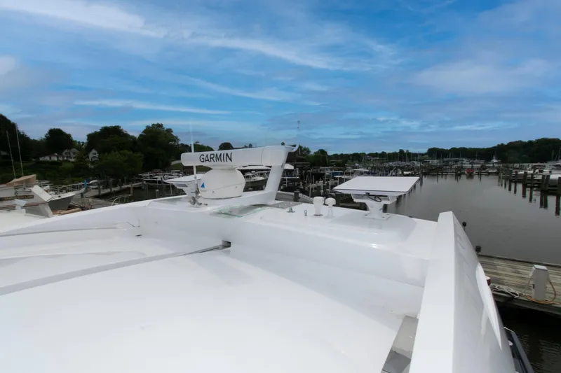 Slide: The Image of 2009 Sunseeker Predator 62 yacht docked at marina with Garmin equipment. - 29