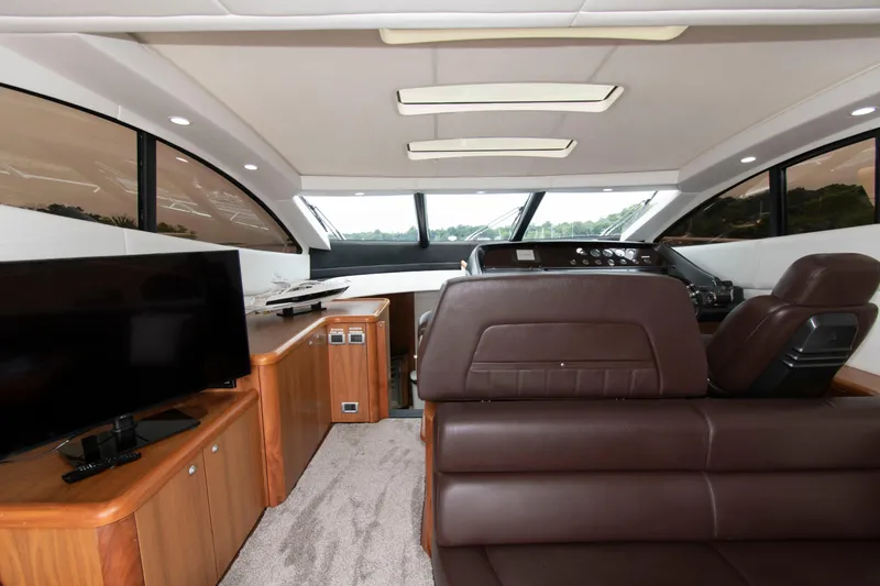 Slide: The Image of Interior of 2009 Sunseeker Predator 62 yacht with leather seating and modern amenities. - 36