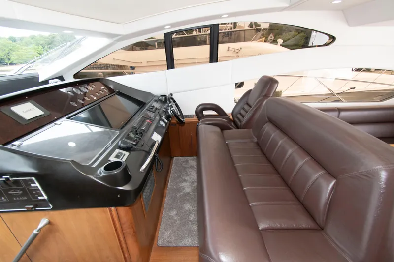 Slide: The Image of Luxurious interior of 2009 Sunseeker Predator 62 yacht with leather seating and modern controls. - 40