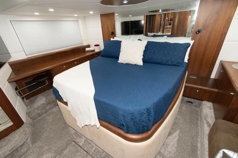 Slide: The Image of Luxurious bedroom interior of 2009 Sunseeker Predator 62 yacht with modern furnishings. - 55