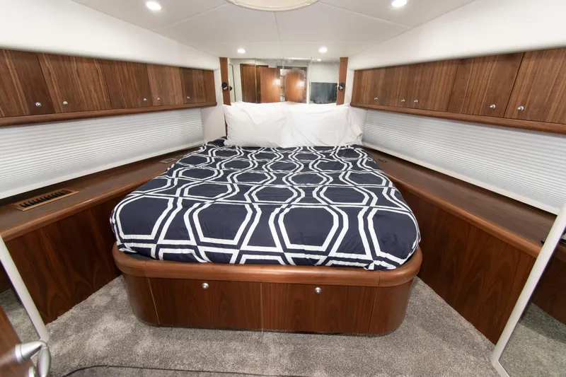 Slide: The Image of Luxurious bedroom interior of 2009 Sunseeker Predator 62 yacht with modern design. - 62