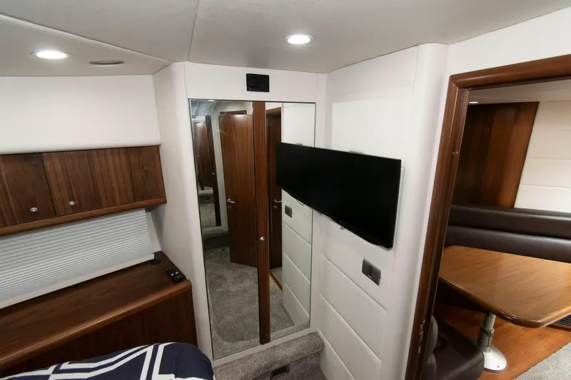 Slide: The Image of Interior of 2009 Sunseeker Predator 62 yacht with modern furnishings and sleek design. - 64