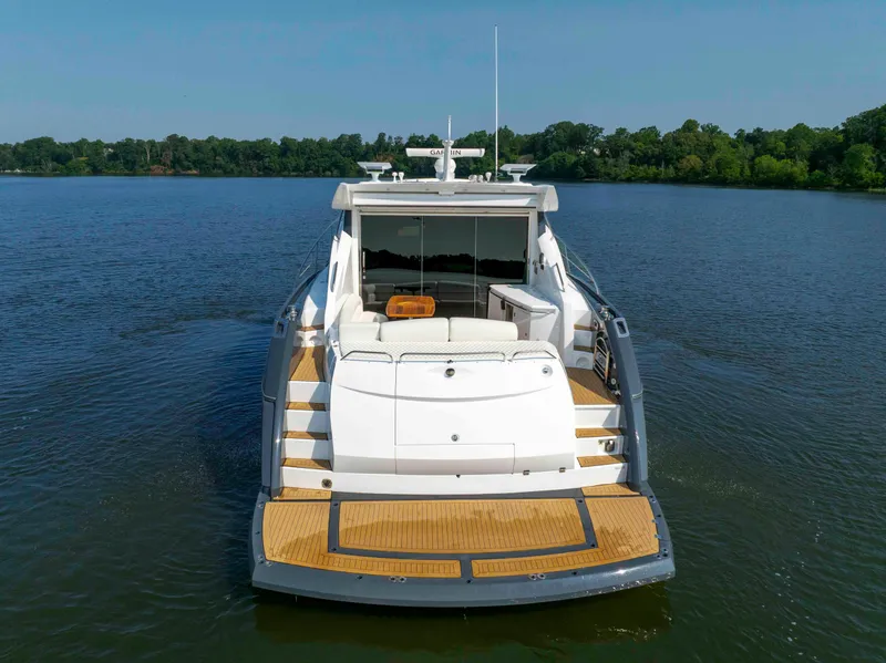 Slide: The Image of 2009 Sunseeker Predator 62 yacht on calm water, rear view. - 9