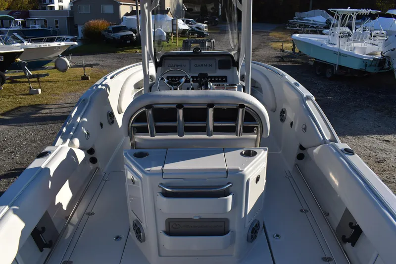Slide: The Image of 2024 Finseeker 230 CC boat interior with console and seating. - 5