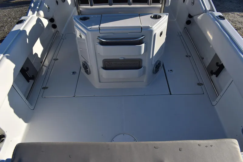 Slide: The Image of 2024 Finseeker 230 CC boat interior with seating and storage compartments. - 8