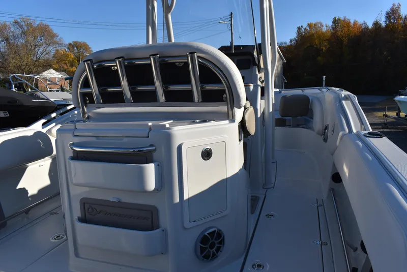 Slide: The Image of 2024 Finseeker 230 CC boat interior with seating and storage compartments. - 9
