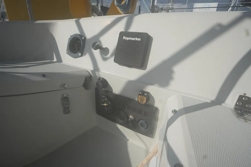 Slide: The Image of Cockpit of 1987 O'Day 322 sailboat with Raymarine equipment and control panel. - 8