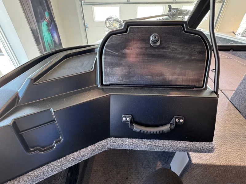 Slide: The Image of Interior of a 2025 G3 AV17SF boat, featuring a storage compartment. - 17