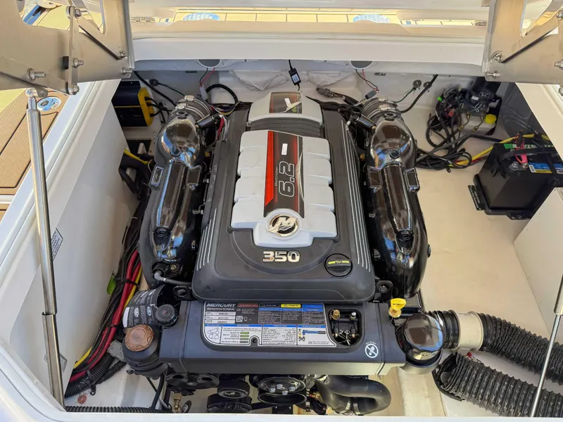 Slide: The Image of Engine compartment of 2025 Chaparral 267 SSX boat, featuring a powerful 6.2L Mercury engine. - 21