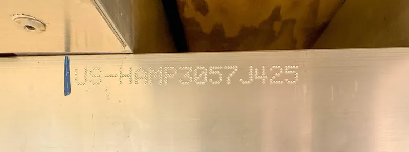 Slide: The Image of Harris Cruiser 230 CWDH 2025 hull identification number on metal surface. - 20