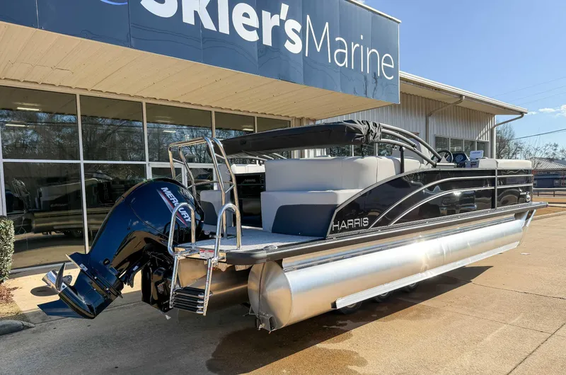 Slide: The Image of 2025 Harris Cruiser 230 CWDH pontoon boat displayed at Skier's Marine dealership. - 7