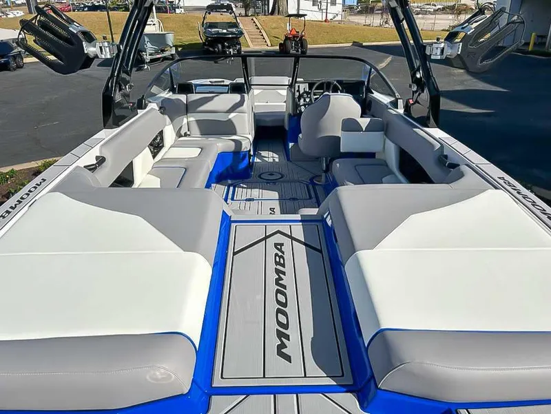 Slide: The Image of 2024 Moomba Mojo boat interior with spacious seating and modern design. - 10