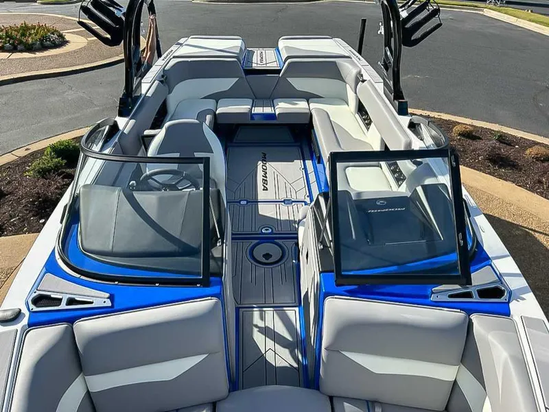 Slide: The Image of 2024 Moomba Mojo boat interior with sleek seating and modern design. - 15