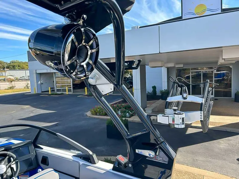 Slide: The Image of 2024 Moomba Mojo boat with sleek design and advanced audio system. - 18