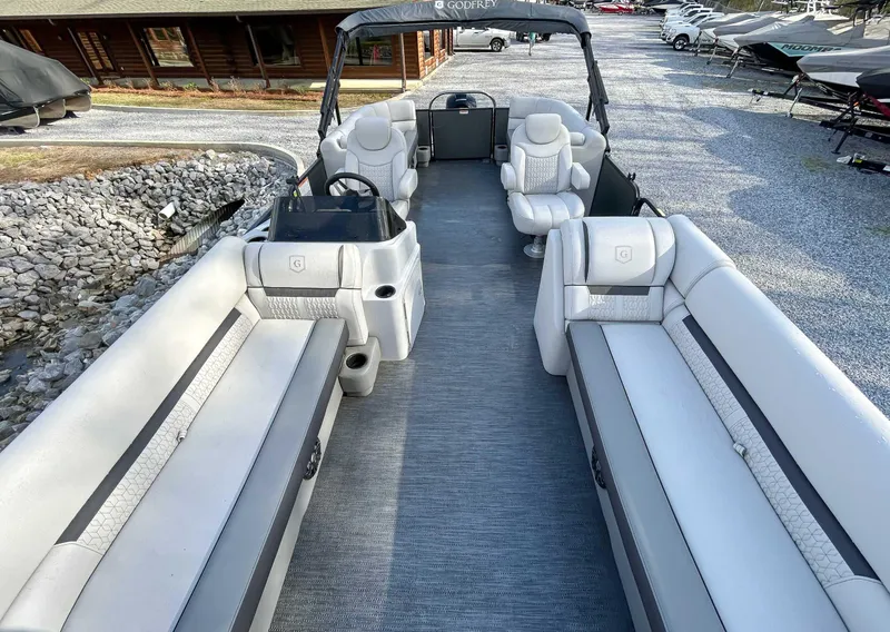 Slide: The Image of 2022 Godfrey Sweetwater pontoon boat with spacious seating and modern design. - 9