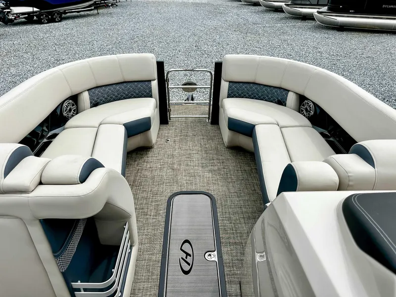 Slide: The Image of 2023 Harris Grand Mariner 230 pontoon boat interior with luxurious seating and modern design. - 11