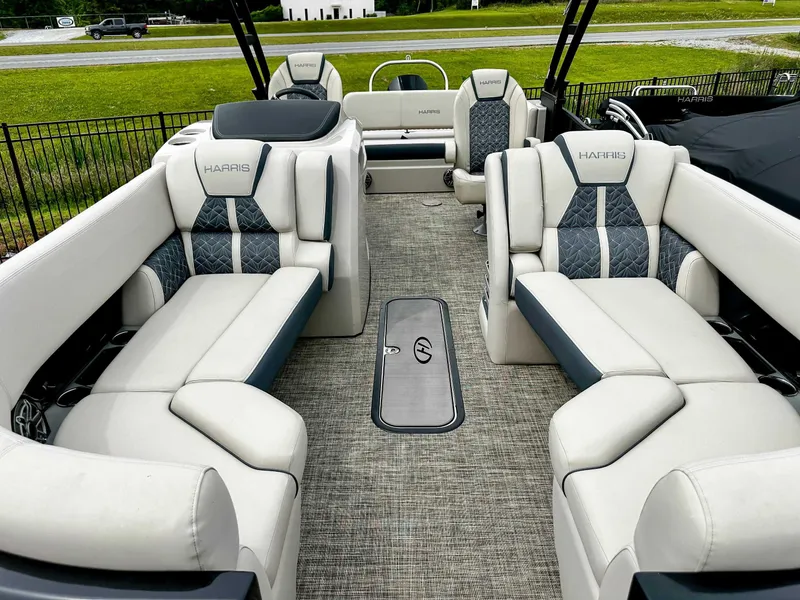 Slide: The Image of Luxurious interior of 2023 Harris Grand Mariner 230 pontoon boat with plush seating. - 14