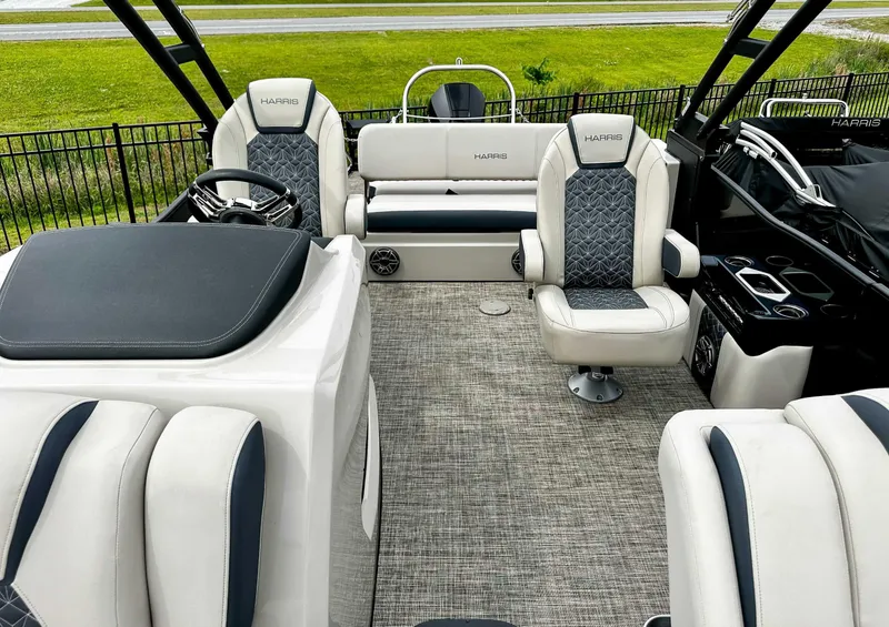 Slide: The Image of 2023 Harris Grand Mariner 230 interior with luxurious seating and modern design. - 15