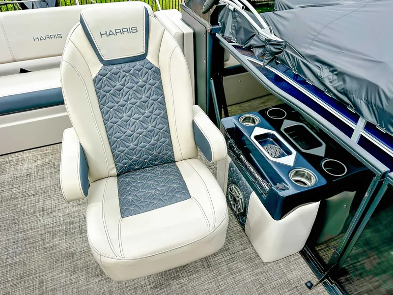 Slide: The Image of Luxurious seating and console on 2023 Harris Grand Mariner 230 pontoon boat. - 16