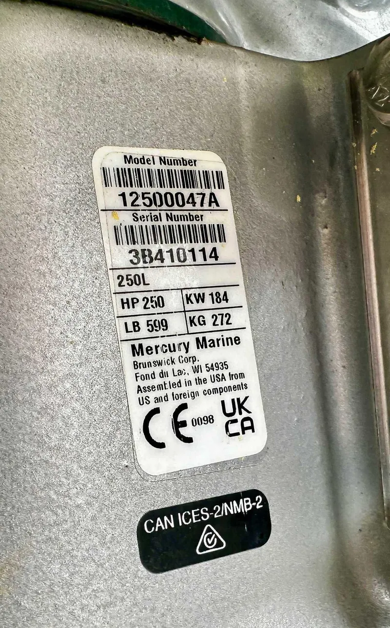 Slide: The Image of Label on 2023 Harris Grand Mariner 230, showing model, serial number, and Mercury Marine specifications. - 24