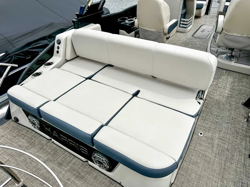 Slide: The Image of 2023 Harris Grand Mariner 230 boat interior with luxurious seating and modern design. - 9