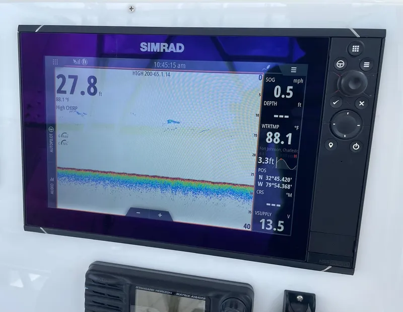 Slide: The Image of Simrad marine display on 2009 Contender 39 Tournament, showing depth and water temperature. - 25