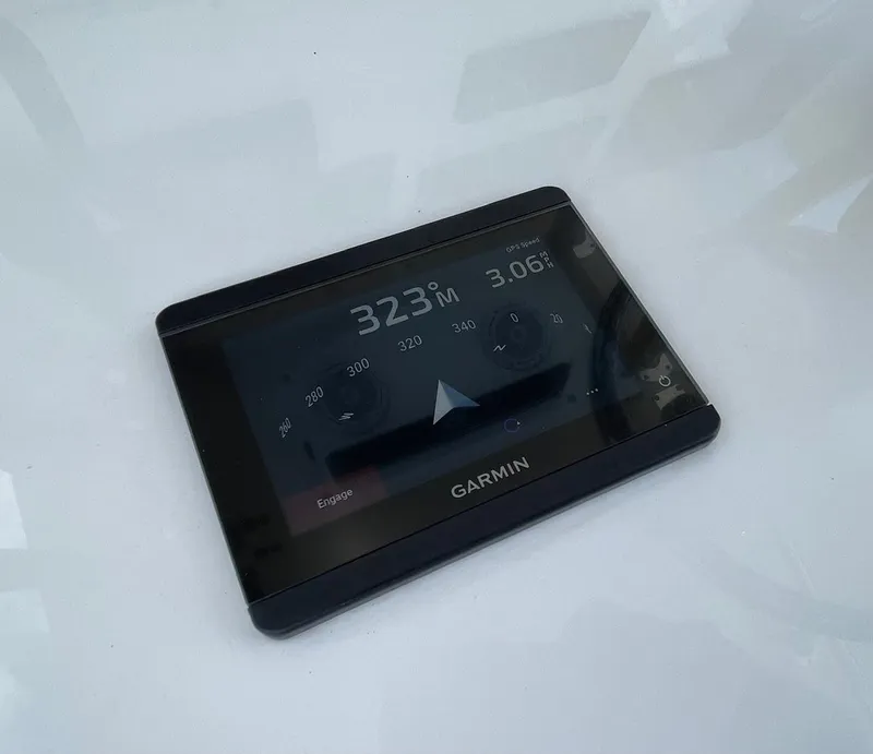 Slide: The Image of Garmin navigation device displaying heading and speed, mounted on a 2009 Contender 39 Tournament boat. - 28