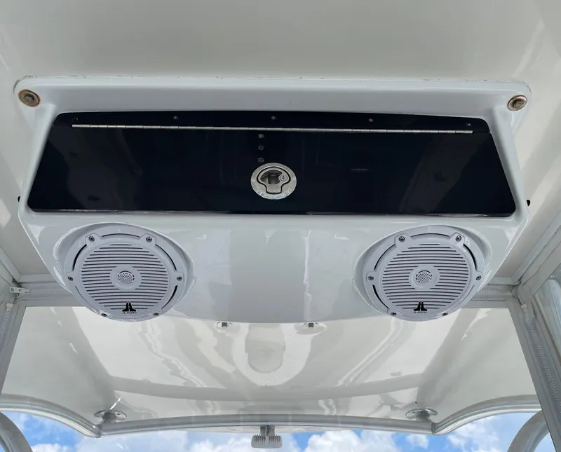 Slide: The Image of 2009 Contender 39 Tournament boat speakers and storage compartment on deck ceiling. - 31