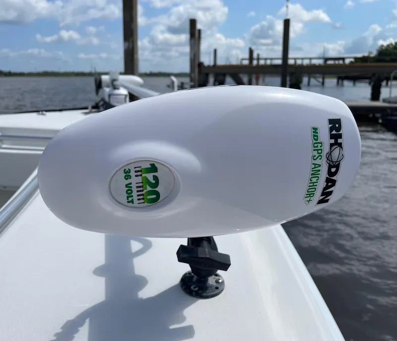 Slide: The Image of Rhoden HD GPS Anchor on 2009 Contender 39 Tournament boat, docked by the water. - 37