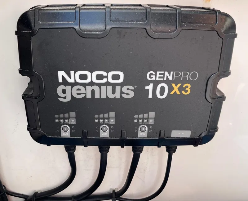 Slide: The Image of NOCO Genius GENPRO 10X3 battery charger on 2009 Contender 39 Tournament boat. - 39