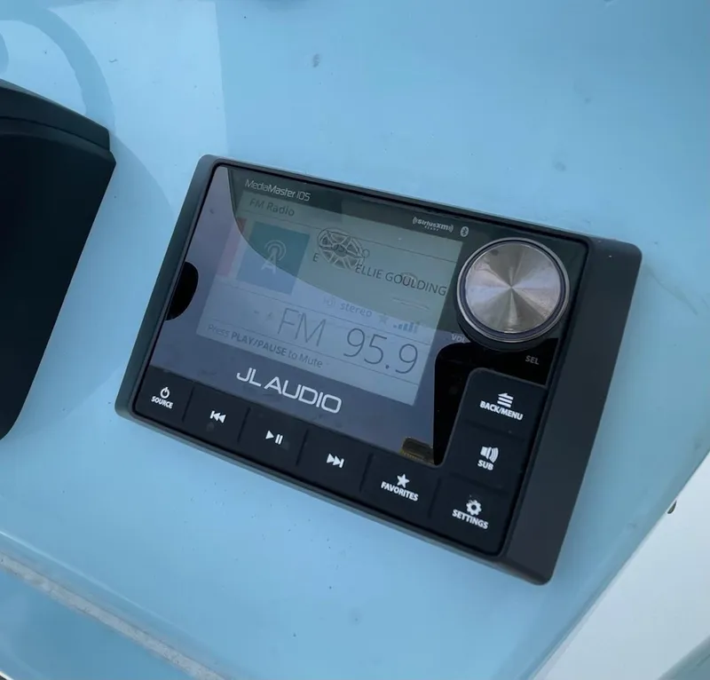 Slide: The Image of Boat audio system display on a 2022 Pathfinder 2600 TRS, showing FM 95.9. - 11