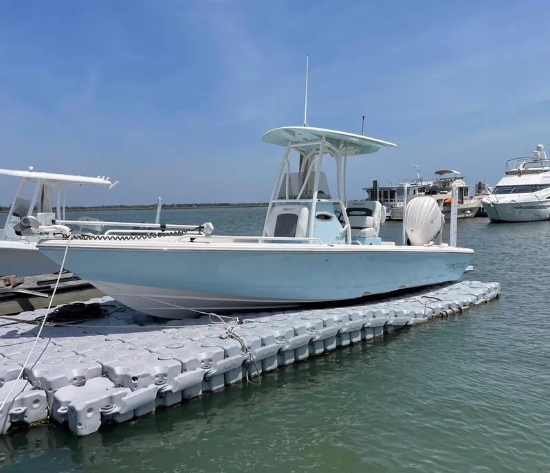 Slide: The Image of 2022 Pathfinder 2600 TRS boat docked on floating platform in marina. - 3