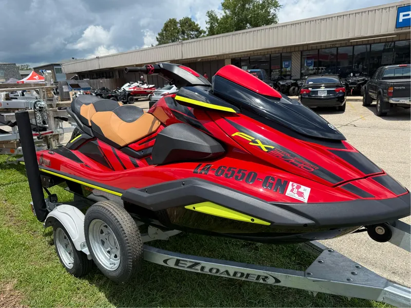 Slide: The Image of 2022 Yamaha FX Cruiser SVHO in red on trailer, parked outdoors. - 5