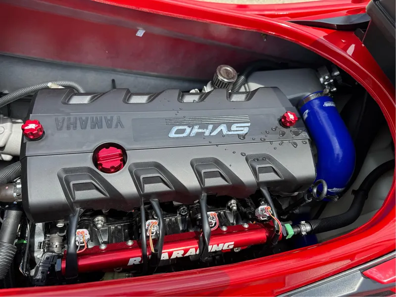 Slide: The Image of 2022 Yamaha FX Cruiser SVHO engine with sleek design and vibrant red accents. - 7