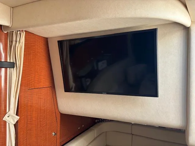 Slide: The Image of Flat-screen TV in 2003 Sea Ray 340 Sundancer cabin interior. - 12