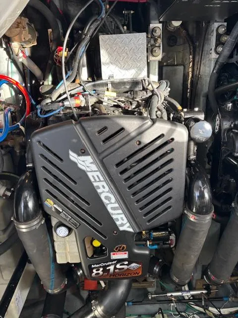 Slide: The Image of Engine compartment of a 2003 Sea Ray 340 Sundancer with Mercury 8.1S motor. - 13