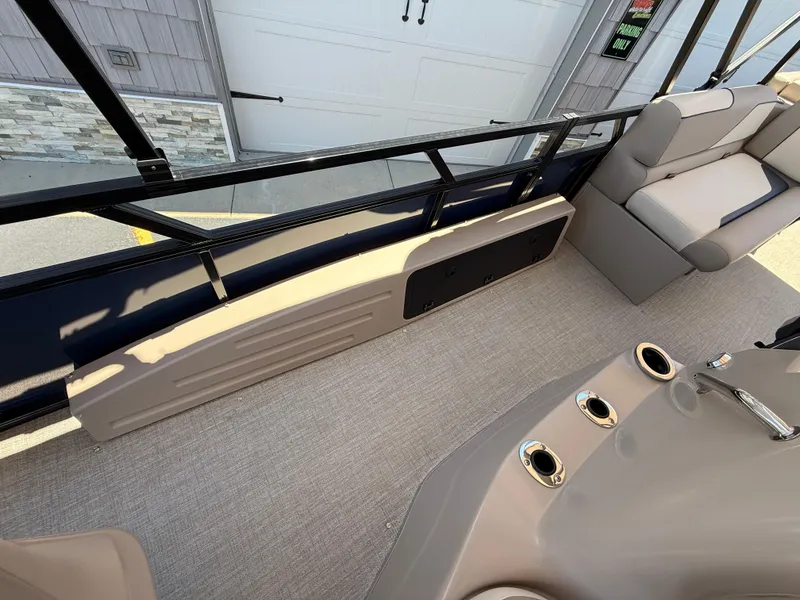 Slide: The Image of 2025 Avalon 2585 Venture boat interior with seating and console, showcasing modern design and functionality. - 20