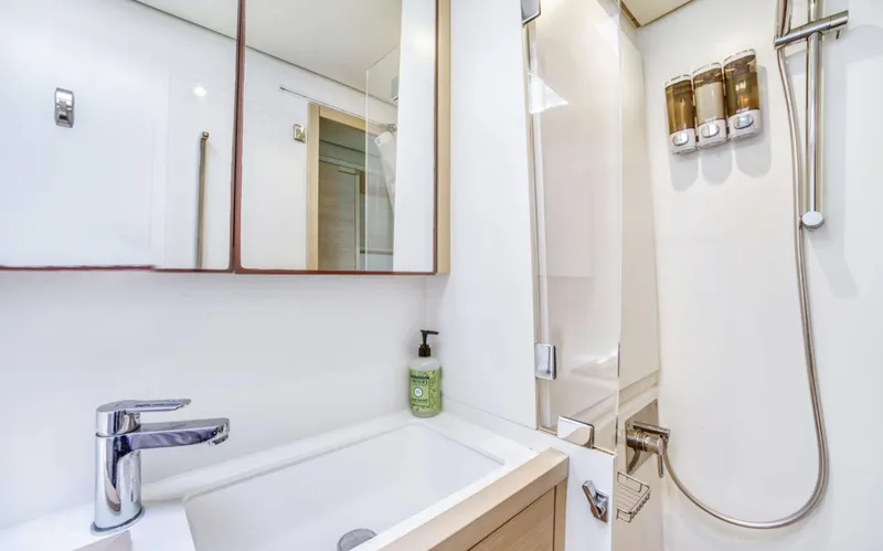 Slide: The Image of Modern bathroom in 2020 Lagoon 620 yacht with sleek fixtures and shower amenities. - 13