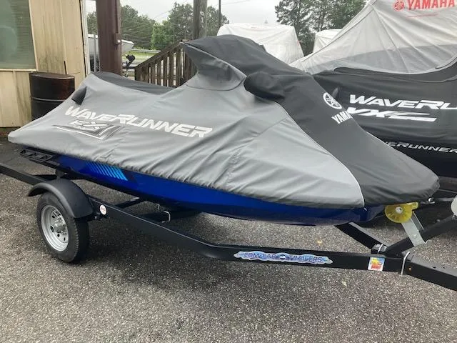 Slide: The Image of 2023 Yamaha WaveRunner EX Limited covered on trailer, parked outdoors. - 10