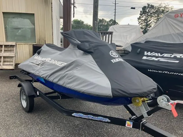 Slide: The Image of 2023 Yamaha WaveRunner EX Limited on trailer, covered, parked outdoors. - 8